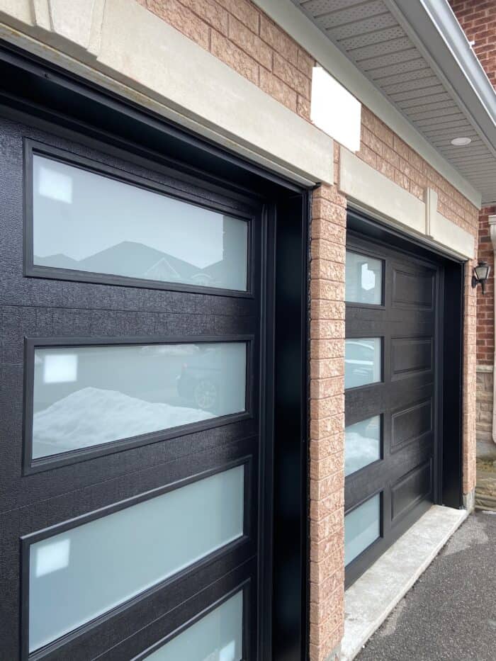 A newly installed garage door in Mckinney TX