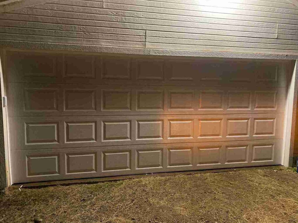 A newly repaired garage door in McKinney TX