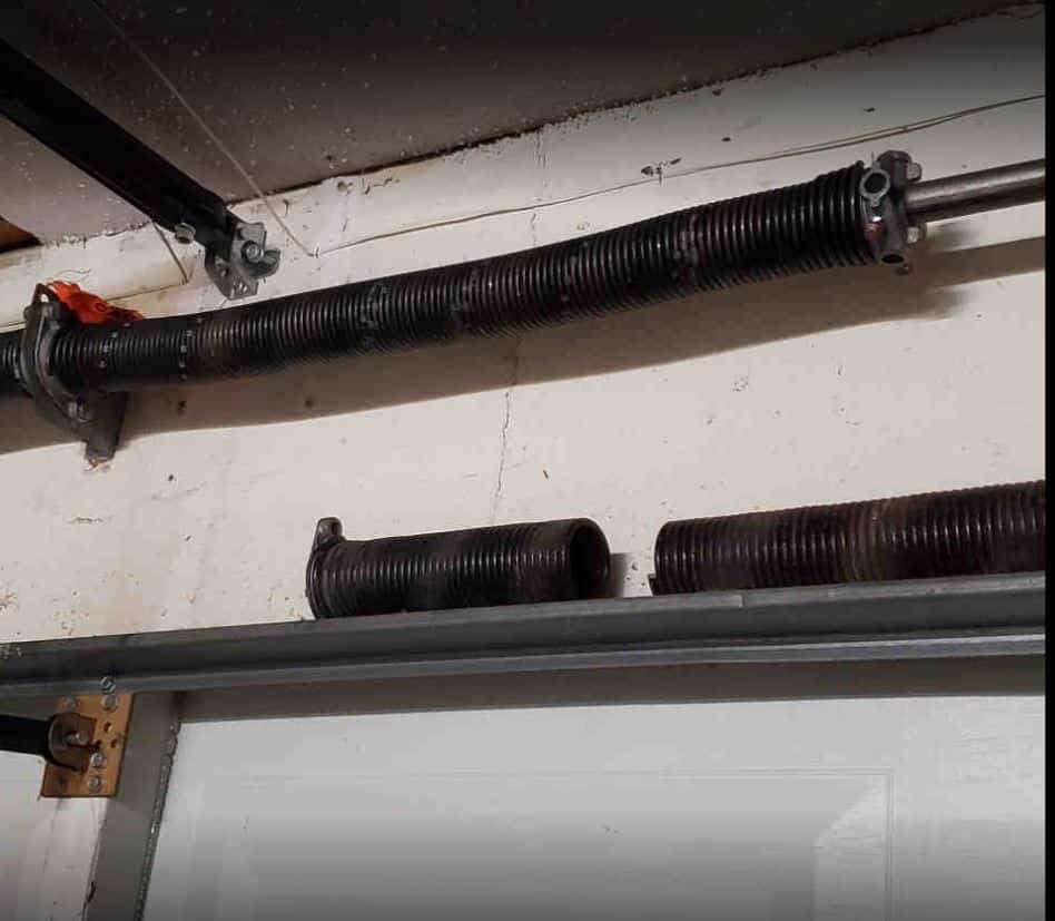 Garage door repair broken spring - Garage Door Service